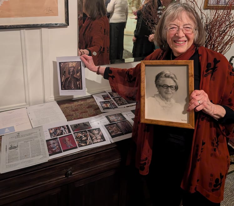 Janet Kestenberg holds photo of Judith Kestenberg